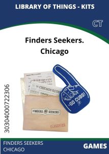 Games - Finders Seekers Chicago Finders Seekers kit for Chicago, featuring a classified envelope, old newspaper, sheet music, and a foam finger cheering "Go Cubs!"