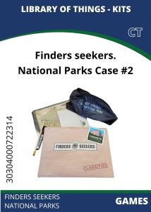 Games - Finders Seekers National Parks Finders Seekers National Parks Case #2 kit displayed on a table, featuring maps, a classified folder, and park-themed items.